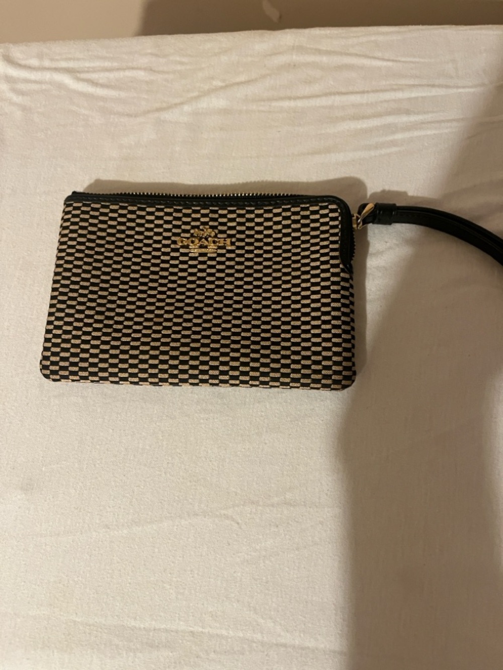Coach Black and Cream Woven Zip Wristlet with Gold Logo
